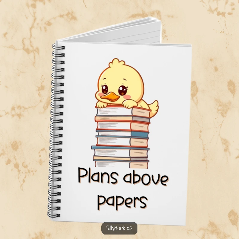 Funny Notebook features a kawaii duck peeking over a tall desk pile with a determined expression, perfect for planning your success.